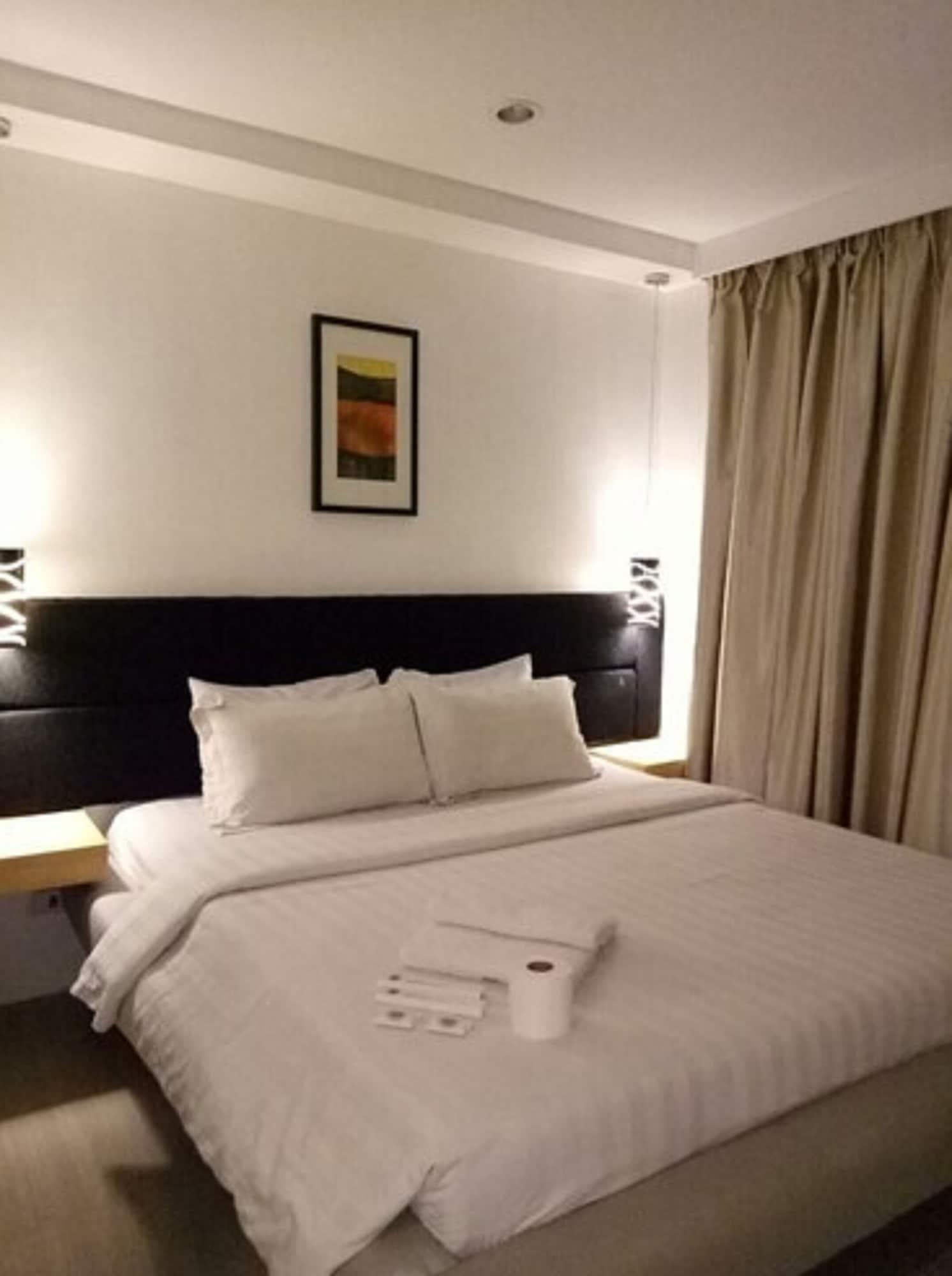 Dragonlink Suites Макати Экстерьер фото
