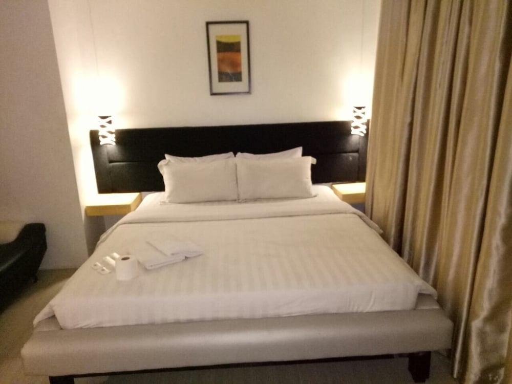 Dragonlink Suites Макати Экстерьер фото