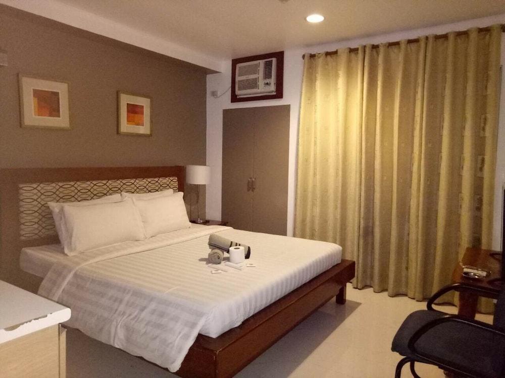 Dragonlink Suites Макати Экстерьер фото